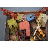 A GROUP OF VINTAGE TIN PLATE CRANE MODELS, of varying size. (qty)