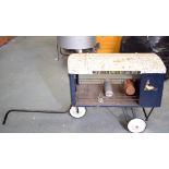 AN ANTIQUE TRIANG THREE WHEELED MILK WAGON OR FLOAT, "Drink a pint a milk a day". 96 cm long.