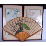 A FRAMED PAIR OF ORIENTAL PRINTS, together with a fan shaped painting depicting exotic birds. Fan 88