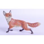 A LATE 19TH CENTURY AUSTRIAN COLD PAINTED BRONZE FIGURE OF A FOX modelled in a roaming stance. 14 cm