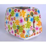 A STYLISH RETRO FRENCH TOASTER, decorated with psychedelic flowers and stars. 22 cm wide.