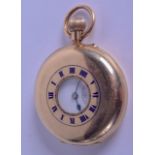 AN ANTIQUE 9CT YELLOW GOLD HALF HUNTER POCKET WATCH with blue enamel numerals to the front. 83.6