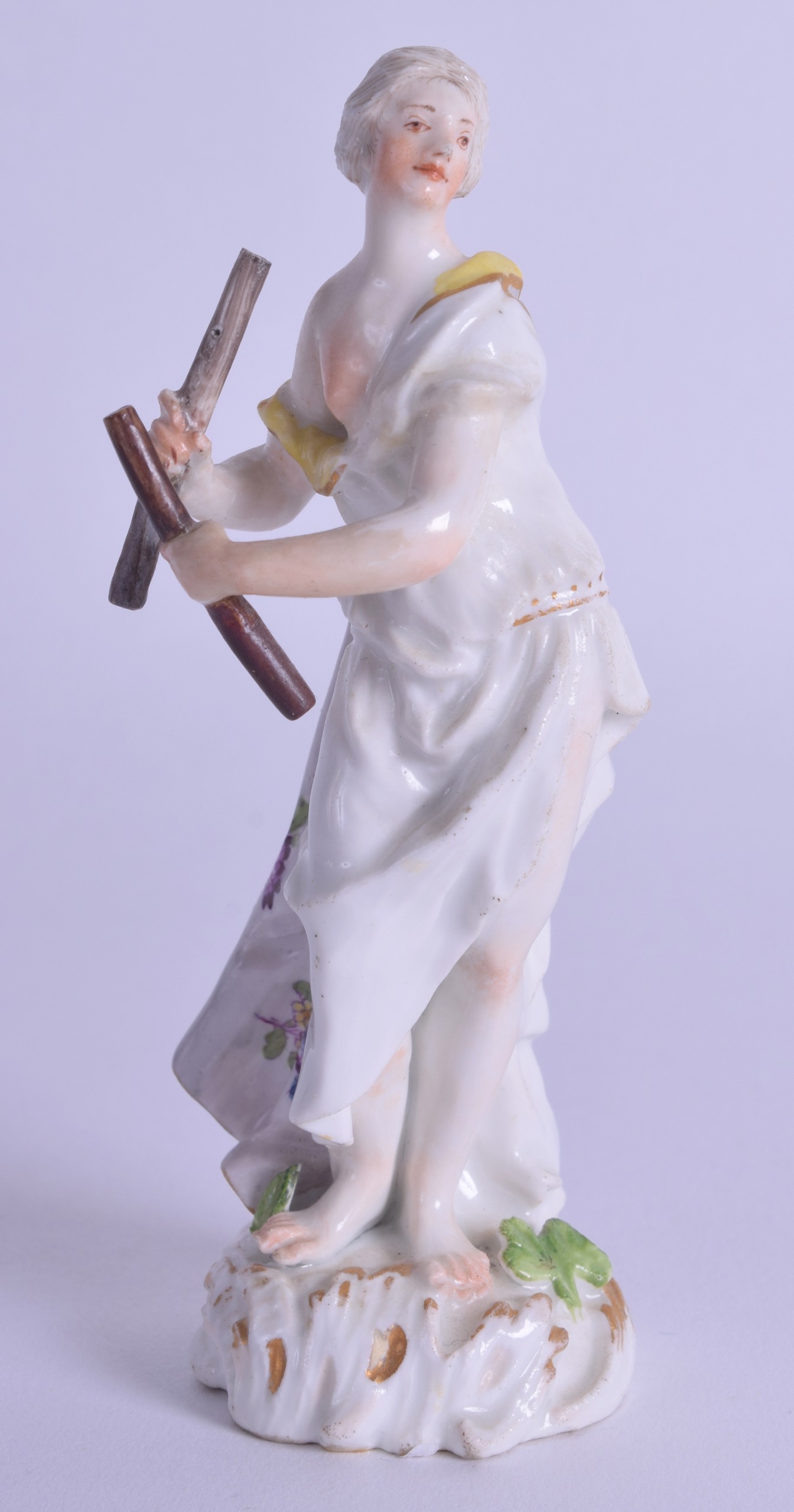 Mid 18th c. Meissen figure of a muse playing music with two wooden sticks