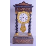 A FRENCH WALNUT PORTICO CLOCK with gilt brass encased dial, the case decorated with floral vines. 45