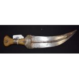 A 19TH CENTURY CARVED RHINOCEROS HORN HANDLED JAMBIYA DAGGER C1880 with white metal mounts. 30 cm