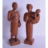 A PAIR OF SOUTH AFRICAN CARVED HARDWOOD TRIBAL FIGURES each modelled upon a square plinth. Note: