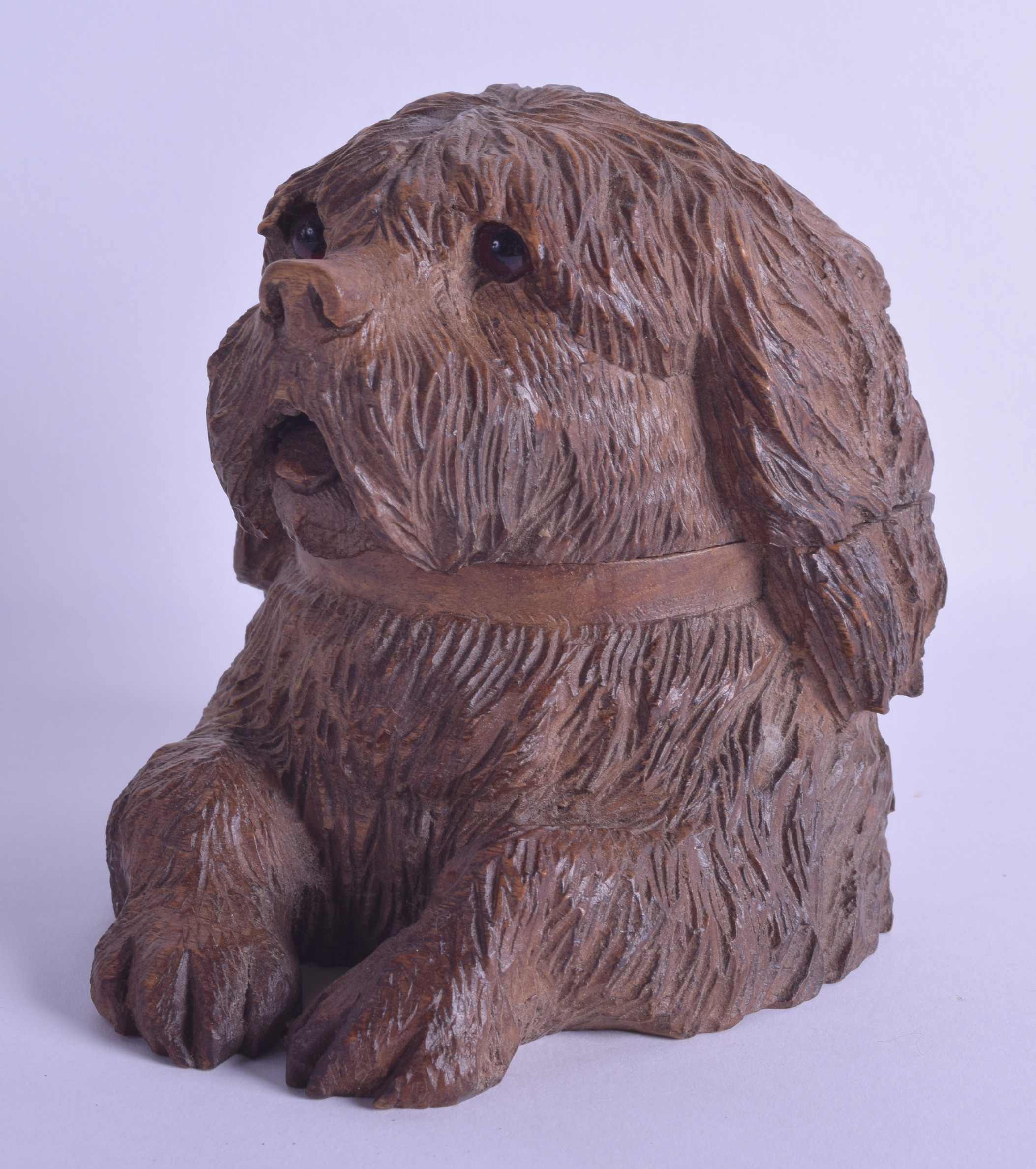 A LATE 19TH CENTURY BAVARIAN BLACK FOREST INKWELL in the form of a begging hound. 14 cm x 14 cm.