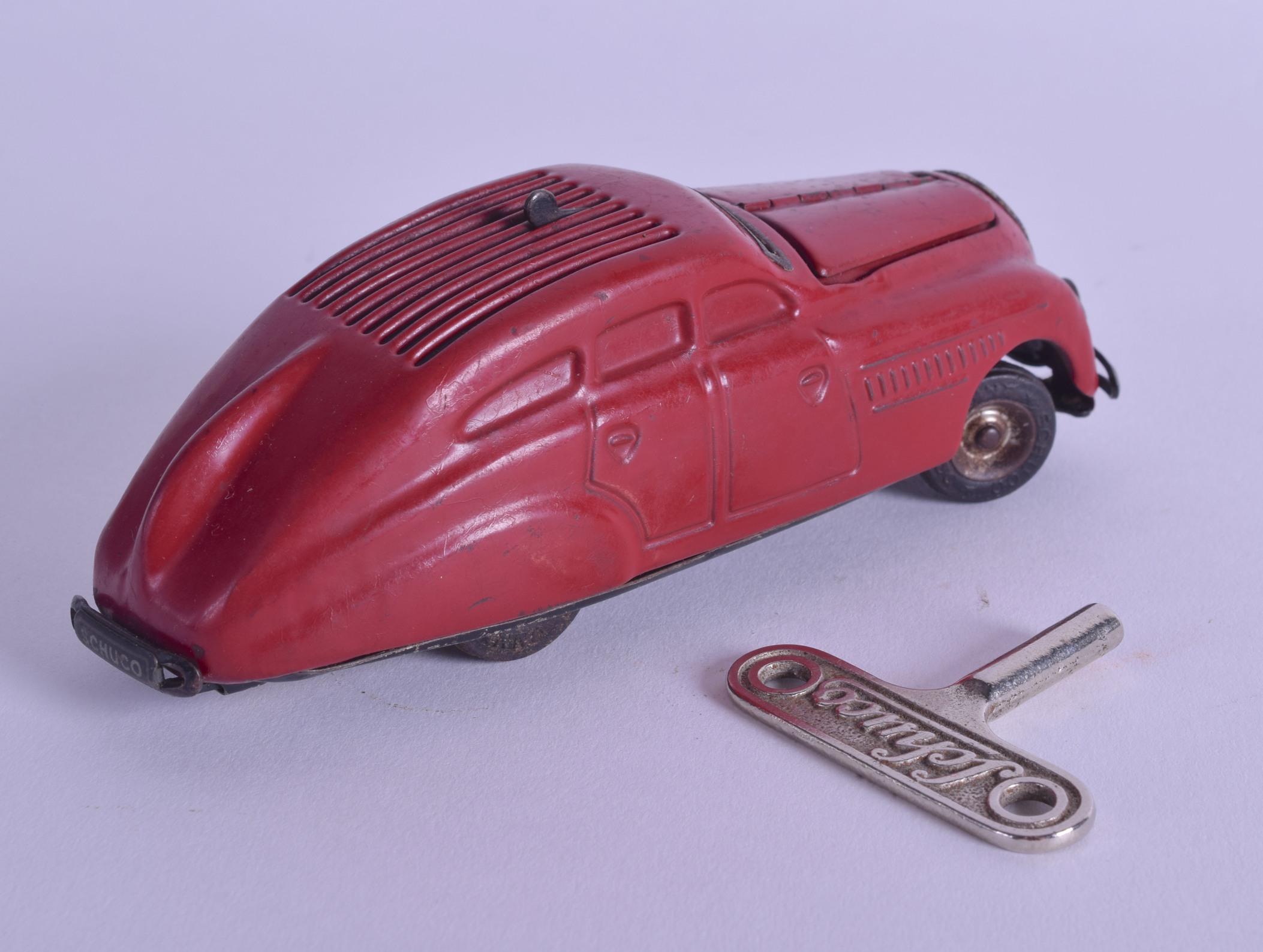 A RARE SCHUCO 'BLOW START' KOMMANDO ANNO 2000 WIND UP CAR. 14 cm long. - Image 2 of 5