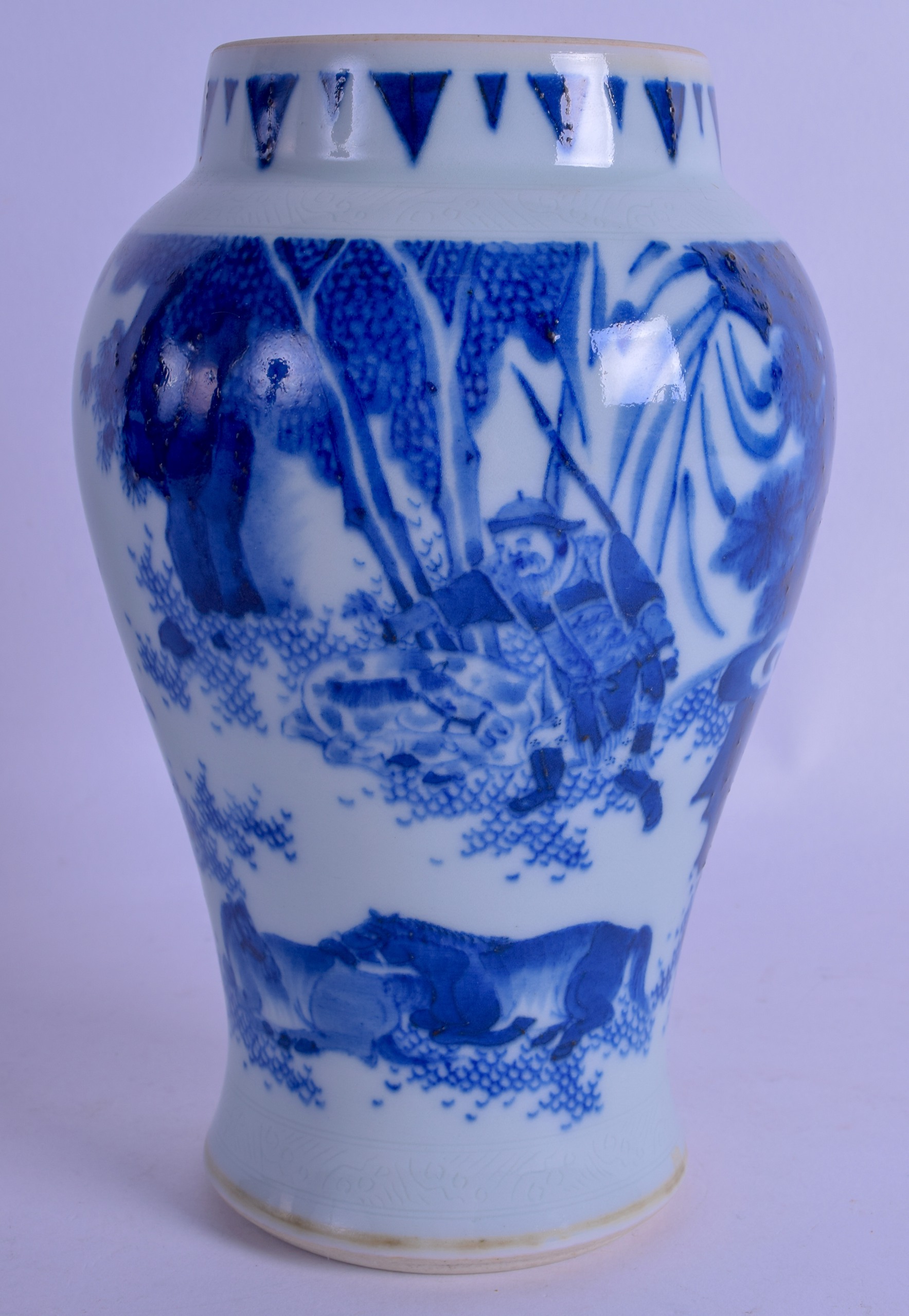 A CHINESE QING DYNASTY BLUE AND WHITE PORCELAIN JAR Transitional style, painted with warriors within