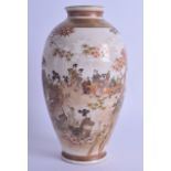 A 19TH CENTURY JAPANESE MEIJI PERIOD SATSUMA VASE painted with geisha and other figures within