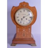 A STYLISH EDWARDIAN MAHOGANY MOTHER OF PEARL INLAID MANTEL CLOCK signed A Taylor of London. 35 cm