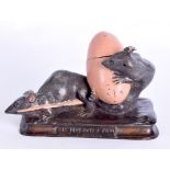 A COLD PAINTED BRONZE FIGURE OF TWO MICE modelled cluching an egg shaped inkwell. 12 cm wide.