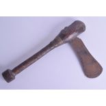 A 19TH CENTURY COPPER HANDLED AFRICAN TRIBAL AXE with central brass banding. 44 cm x 27 cm.