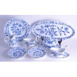 A GOOD 19TH/20TH CENTURY GERMAN BLUE AND WHITE PORCELAIN DINNER SERVICE mainly Meissen, painted with