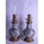 A GOOD PAIR OF 19TH CENTURY CHINESE CLOISONNE ENAMEL VASES Qing, converted to oil lamps, decorated