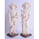 A FINE LARGE PAIR OF 19TH CENTURY EUROPEAN DIEPPE IVORY FIGURES OF A MALE AND FEMALE modelled with
