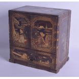 AN UNUSUAL 19TH CENTURY JAPANESE MEIJI PERIOD BLACK LACQUER CABINET decorated in relief with