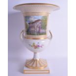 A VERY LARGE 19TH CENTURY GERMAN KPM PORCELAIN TWIN HANDLED CAMPAGNA URN painted with a building