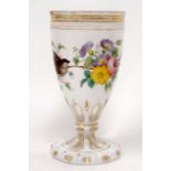 AN UNUSUAL 19TH CENTURY BOHEMIAN ENAMELLED BEAKER painted with a bird perched amongst floral sprigs.