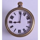 A RARE ROYAL FLYING CORPS BRASS CLOCK Patent Applied for No 18916. 6 cm wide.
