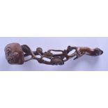 A LARGE CHINESE CARVED HARDWOOD RUI SCEPTRE of naturalistic form. 40 cm long.