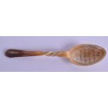 A 19TH CENTURY MIDDLE EASTERN ISLAMIC CARVED HORN SPOON decorated with extensive calligraphy. 18