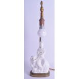 AN EARLY 20TH CENTURY CHINESE BLANC DE CHINE PORCELAIN FIGURE OF GUANYIN converted to a lamp,