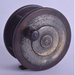 A 19TH CENTURY EATON AND DELLER FLY FISHING REEL with engraved metal mounts. 11.5 cm wide.