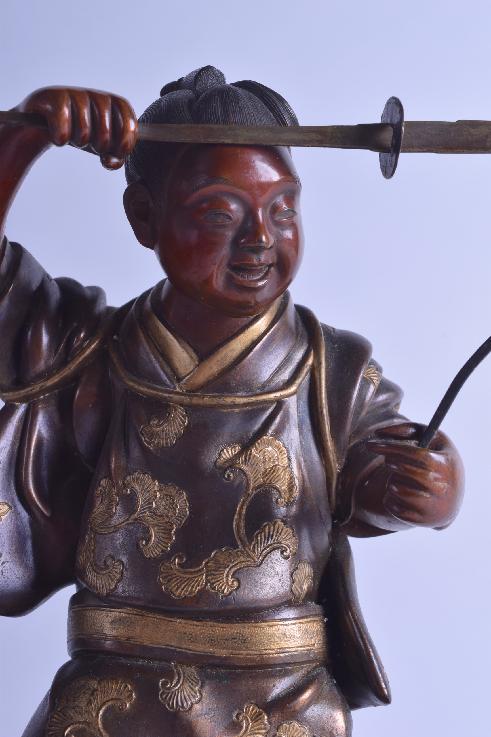 A GOOD 19TH CENTURY JAPANESE MEIJI PERIOD BRONZE OKIMONO by Miyao, modelled as a male wearing gilt - Image 4 of 4