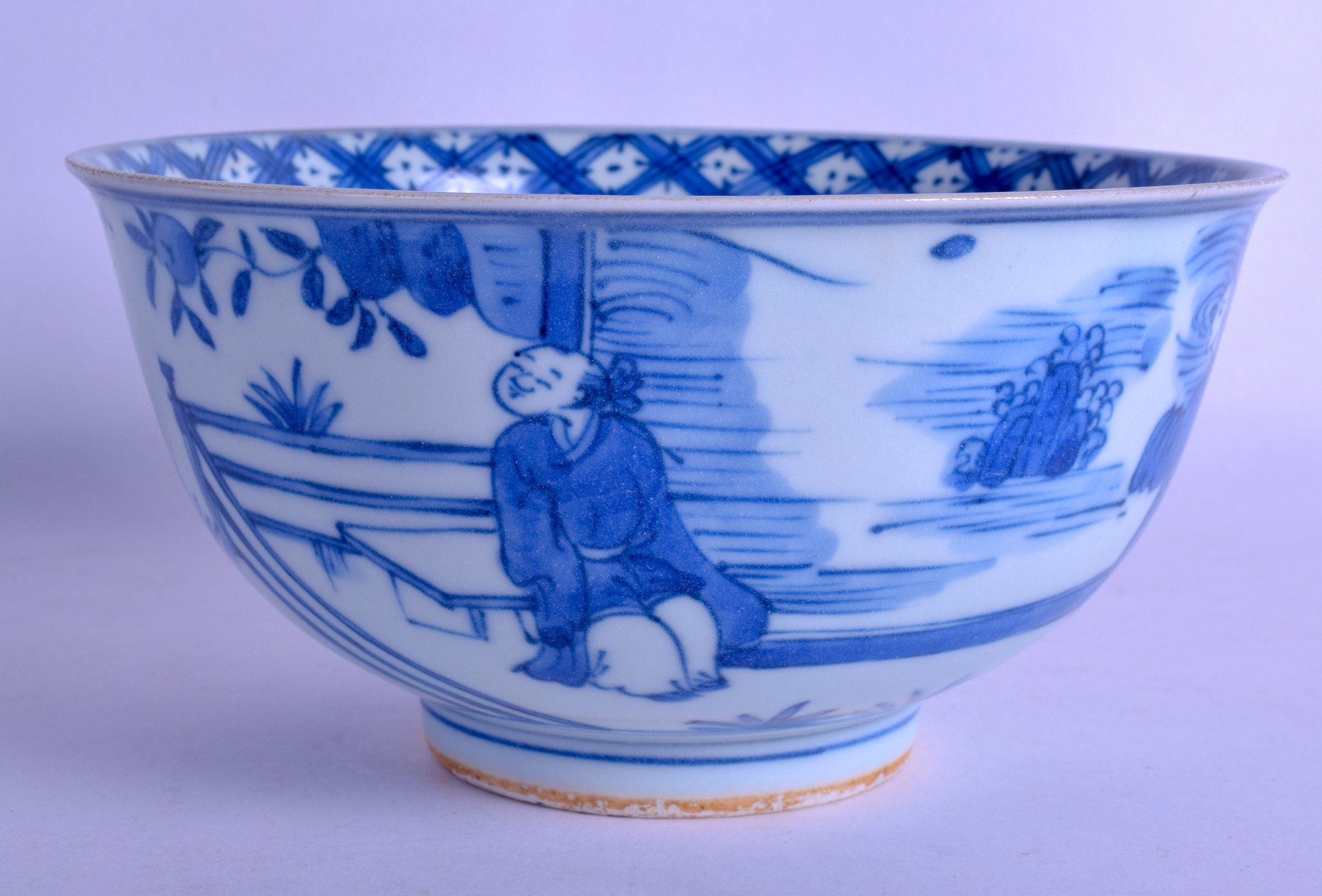 A CHINESE QING DYNASTY BLUE AND WHITE PORCELAIN BOWL bearing Wanli marks to base, painted with