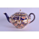 A ROYAL CROWN DERBY MINITURE IMARI TEAPOT AND COVER painted with flowers. 7.25 cm wide.