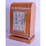 A LOVELY ART DECO BURR WALNUT ANGULAR MANTEL CLOCK with rectangular silvered dial and stylised