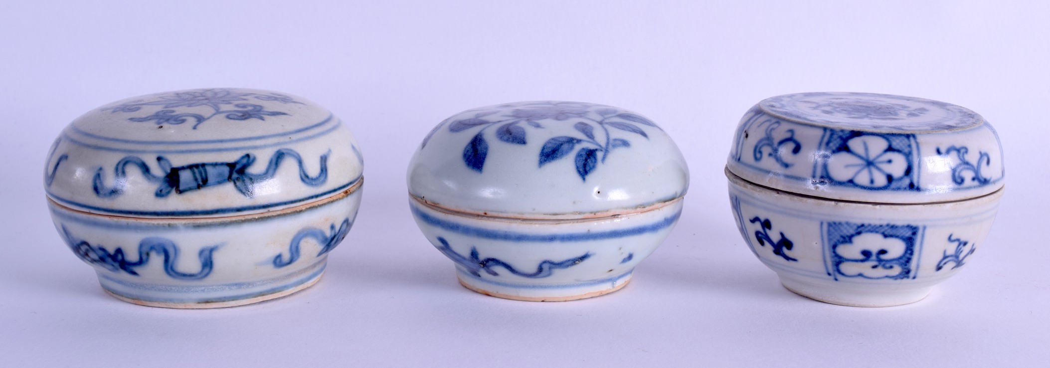 A GROUP OF THREE 18TH CENTURY CHINESE BLUE AND WHITE COSMETIC BOXES AND COVERS Qianlong, painted