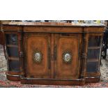 A FINE VICTORIAN BURR WALNUT BREAKFRONT CREDENZA, inset with Sevres panels mounted in gilt bronze.