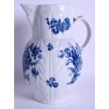 18th c. Caughley good mask jug of large size printed with floral bouquets in underglaze blue on a