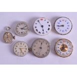 A GROUP OF SEVEN WATCHES FACES AND MOVEMENTS. (7)