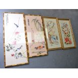 FOUR 20TH CENTURY SILK PANELS, decorated with birds amongst foliage. (4)