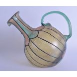 AN UNUSUAL TIFFANY STYLE STAINED GLASS TYPE GLASS EWER with loop handle. 25 cm wide.