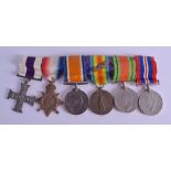 A MILITARY CROSS MEDAL SET presented to Major C W G Bryan. (6)