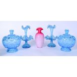 A PAIR OF BLUE GLASS EPERGNE, together with a pair of jars and another vase. (5)