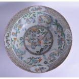 A LARGE 19TH CENTURY CHINESE FAMILLE VERTE PORCELAIN BASIN painted with figures within landscapes in