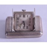 AN EARLY 20TH CENTURY TAVANNES WATCH CO SILVER FOLDING TRAVELLING WATCH with stylised numerals. 3.25