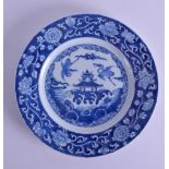 A 17TH CENTURY CHINESE BLUE AND WHITE PORCELAIN PLATE Kangxi, painted with two birds in flight