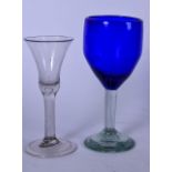 A GEORGIAN WINE GLASS, together with a later blue glass. Largest 19 cm.