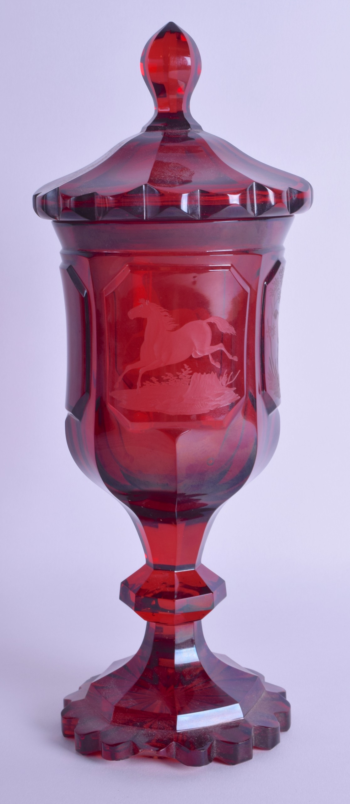 A 19TH CENTURY BOHEMIAN RUBY GLASS GOBLET VASE AND COVER engraved with roaming horses within - Image 2 of 3