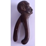 AN UNUSUAL PAIR OF LATE 19TH CENTURY BAVARIAN BLACK FOREST 'MOUSTACHE MAN' NUT CRACKERS. 21 cm