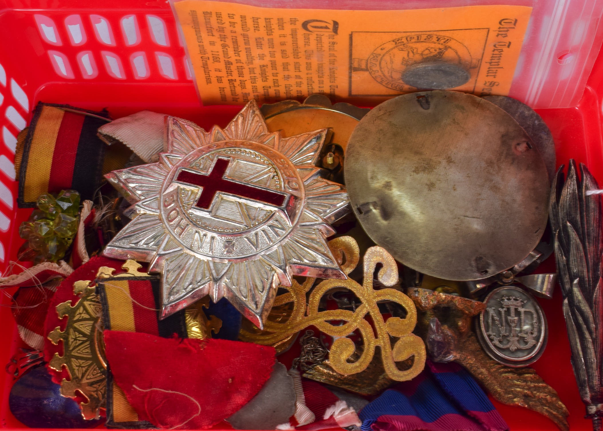 A QUANTITY OF BADGES, together with ribbons and others. (qty)