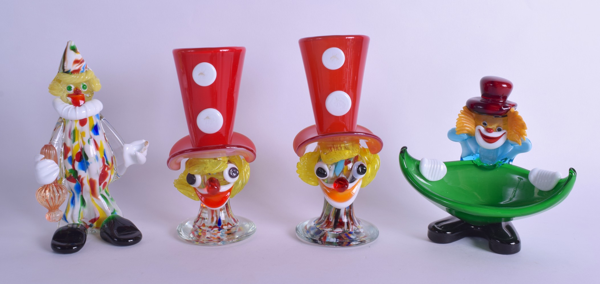 A PAIR OF MURANO GLASS CLOWN VASES together with two other figures. Largest 20 cm high. (4)