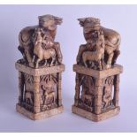 A LARGE PAIR OF LATE 19TH CENTURY CHINESE HARDSTONE SEALS modelled with buffalo and young upon