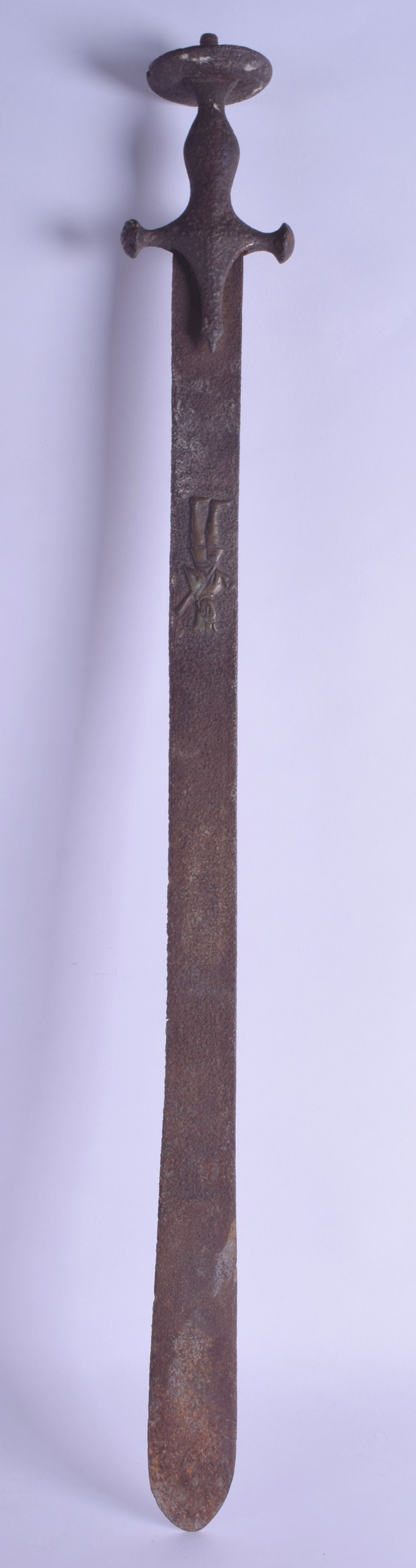 A VIKING STYLE TAPERING BRONZE SWORD decorated in relief with a standing classical figure to the